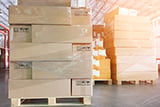 pallets of boxes on a warehouse floor